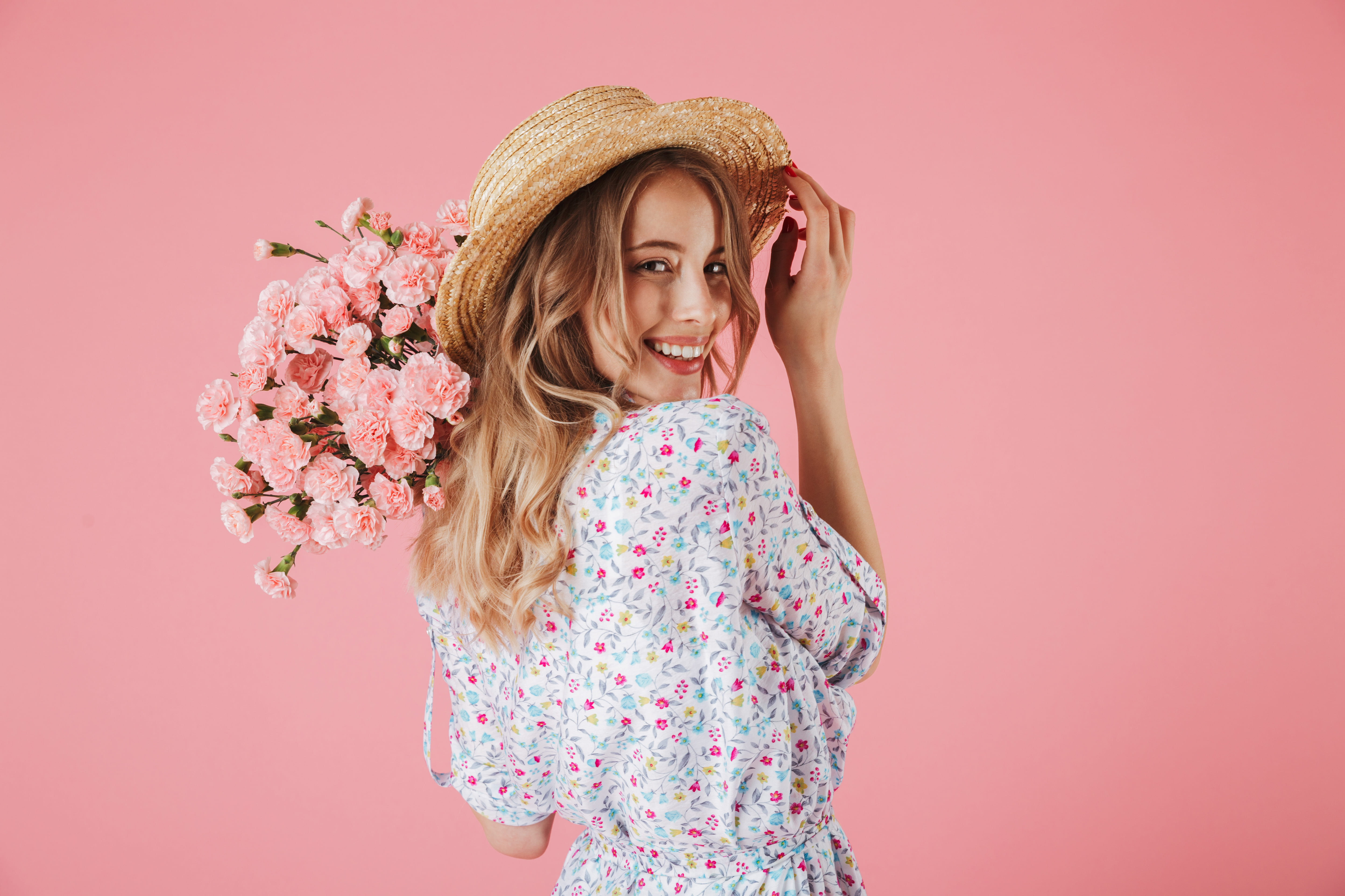 woman with hat and flowers